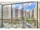 Private balcony overlooking the community courtyard at 14501 Grove Resort Ave # 1430, Winter Garden, FL 34787