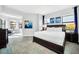 Spacious bedroom with a king-size bed and ample natural light at 14501 Grove Resort Ave # 1430, Winter Garden, FL 34787