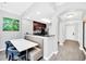 Kitchen with breakfast bar and built-in seating at 14501 Grove Resort Ave # 1430, Winter Garden, FL 34787