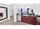 Granite countertop kitchen with stainless steel appliances at 14501 Grove Resort Ave # 1430, Winter Garden, FL 34787