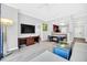 Living area with sectional sofa and home office space at 14501 Grove Resort Ave # 1430, Winter Garden, FL 34787