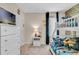 Bunk beds and Minions-themed decor create a vibrant ' bedroom at 5288 Oakbourne Ave, Davenport, FL 33837