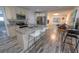 Modern kitchen with granite island and stainless steel appliances at 2627 Ambergate Rd, Winter Park, FL 32792