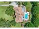 Top-down view of house, pool, and surrounding grounds at 10980 Jim Edwards Rd, Haines City, FL 33844
