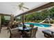Inviting pool area with patio furniture and a refreshing pool at 10980 Jim Edwards Rd, Haines City, FL 33844