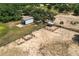 Aerial view of horse stalls and storage shed at 10980 Jim Edwards Rd, Haines City, FL 33844
