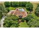 House with pool and lush landscaping visible from above at 10980 Jim Edwards Rd, Haines City, FL 33844