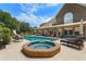 Relaxing hot tub and pool area with lounge chairs at 10980 Jim Edwards Rd, Haines City, FL 33844