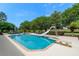 Sparkling in-ground pool with diving board and slide at 10980 Jim Edwards Rd, Haines City, FL 33844