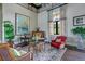 Elegant common area with comfortable seating and large artwork at 544 Waterfern Trail Dr, Auburndale, FL 33823