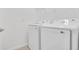 Modern laundry room with white Samsung washer and dryer at 311 Ballo Dr, Kissimmee, FL 34746