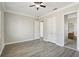 Spacious bedroom with wood flooring and ceiling fan at 1554 Fairview Cir, Kissimmee, FL 34747