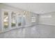 Spacious dining area with French doors leading to patio at 1554 Fairview Cir, Kissimmee, FL 34747