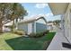 Detached storage building with light blue siding at 1554 Fairview Cir, Kissimmee, FL 34747