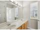 Bright bathroom with double vanity and updated fixtures at 1554 Fairview Cir, Kissimmee, FL 34747