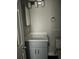 Clean bathroom with gray vanity and a toilet at 2512 Woodgate Blvd # 104, Orlando, FL 32822