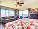 Primary bedroom with king bed and ocean view at 1513 Ocean Shore Blvd # 9E, Ormond Beach, FL 32176