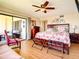 Primary bedroom with king bed and access to balcony at 1513 Ocean Shore Blvd # 9E, Ormond Beach, FL 32176