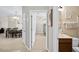 Hallway view of the dining area and bathroom at 165 Captain Hook Way, Davenport, FL 33837