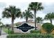 Community entrance sign and landscaping at 165 Captain Hook Way, Davenport, FL 33837