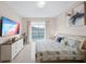 Main bedroom with king bed and sliding doors to pool at 165 Captain Hook Way, Davenport, FL 33837