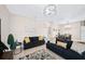Relaxing living room with two sofas, a coffee table, and tasteful decor at 165 Captain Hook Way, Davenport, FL 33837