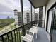 Screened balcony with outdoor seating and community views at 14501 Grove Resort Ave # 2541, Winter Garden, FL 34787