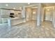 Modern kitchen with island and open floor plan at 1278 Tagliamento Ln, Haines City, FL 33844