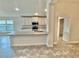 Spacious kitchen with island and stainless steel appliances at 1278 Tagliamento Ln, Haines City, FL 33844