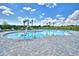 Community pool with accessible entry and lounge chairs at 1278 Tagliamento Ln, Haines City, FL 33844