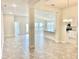 Open concept dining area with views into the kitchen and living room at 1278 Tagliamento Ln, Haines City, FL 33844
