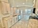 Modern kitchen with stainless steel appliances and granite countertops at 1278 Tagliamento Ln, Haines City, FL 33844