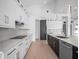 Modern kitchen with white cabinets and marble countertops at 260 Deer Isle Dr, Winter Garden, FL 34787