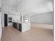 Bright kitchen features a large island and opens to the living area at 260 Deer Isle Dr, Winter Garden, FL 34787