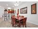 Open concept dining room with kitchen partially visible at 1375 Tuscana Ln # 1308, Davenport, FL 33896