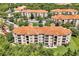 Aerial view of a large apartment complex with red tile roofs at 1375 Tuscana Ln # 1308, Davenport, FL 33896