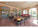 Community room with tables and chairs for residents at 1375 Tuscana Ln # 1308, Davenport, FL 33896