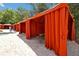 Private cabanas provide shade and comfort by the pool at 1375 Tuscana Ln # 1308, Davenport, FL 33896