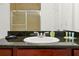 Bathroom vanity with granite countertop and sink at 1375 Tuscana Ln # 1308, Davenport, FL 33896