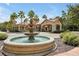 Elegant fountain in front of community building entrance at 1375 Tuscana Ln # 1308, Davenport, FL 33896