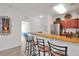 Kitchen with granite countertops and stainless steel appliances at 1375 Tuscana Ln # 1308, Davenport, FL 33896