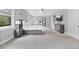 Main bedroom with king bed, ample closet space, and large windows at 1317 Spring Lake Ter, Ocoee, FL 34761