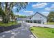 Luxury home with a long driveway and a two-car garage at 1317 Spring Lake Ter, Ocoee, FL 34761
