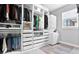 Large walk-in closet with ample shelving and hanging space at 1317 Spring Lake Ter, Ocoee, FL 34761