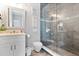 Modern bathroom with walk-in shower and vanity at 1317 Spring Lake Ter, Ocoee, FL 34761