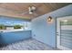 Private balcony with lake views and ceiling fan at 1317 Spring Lake Ter, Ocoee, FL 34761
