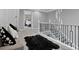 Upstairs sitting area with comfortable seating and plush rug at 1317 Spring Lake Ter, Ocoee, FL 34761