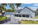 Two-story house with attached garage and solar panels at 1317 Spring Lake Ter, Ocoee, FL 34761