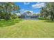Spacious backyard with large grassy area and soccer goal at 1317 Spring Lake Ter, Ocoee, FL 34761
