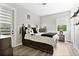Spacious bedroom with a large bed and plenty of storage at 1317 Spring Lake Ter, Ocoee, FL 34761